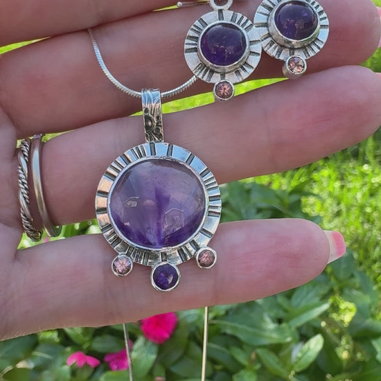 Video of Amethyst and Pink Tourmaline Pendant with matching earrings featuring a similar design and gemstones