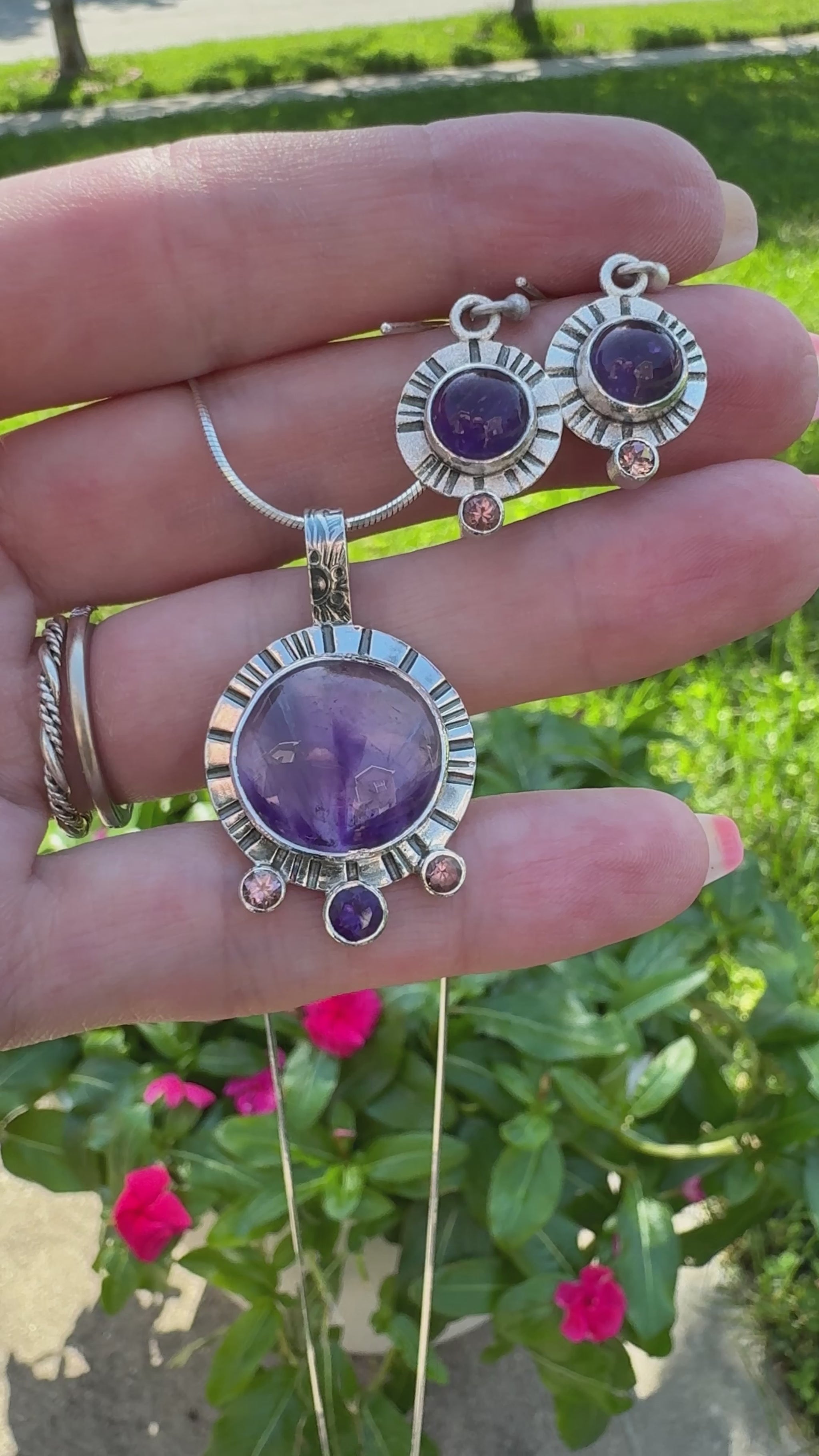 Video of Amethyst and Pink Tourmaline Pendant with matching earrings featuring a similar design and gemstones